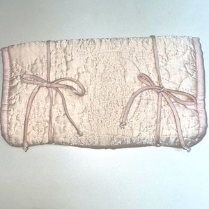 Monique Lhuillier & Pottery Barn jewelry travel bag in baby pink satin.